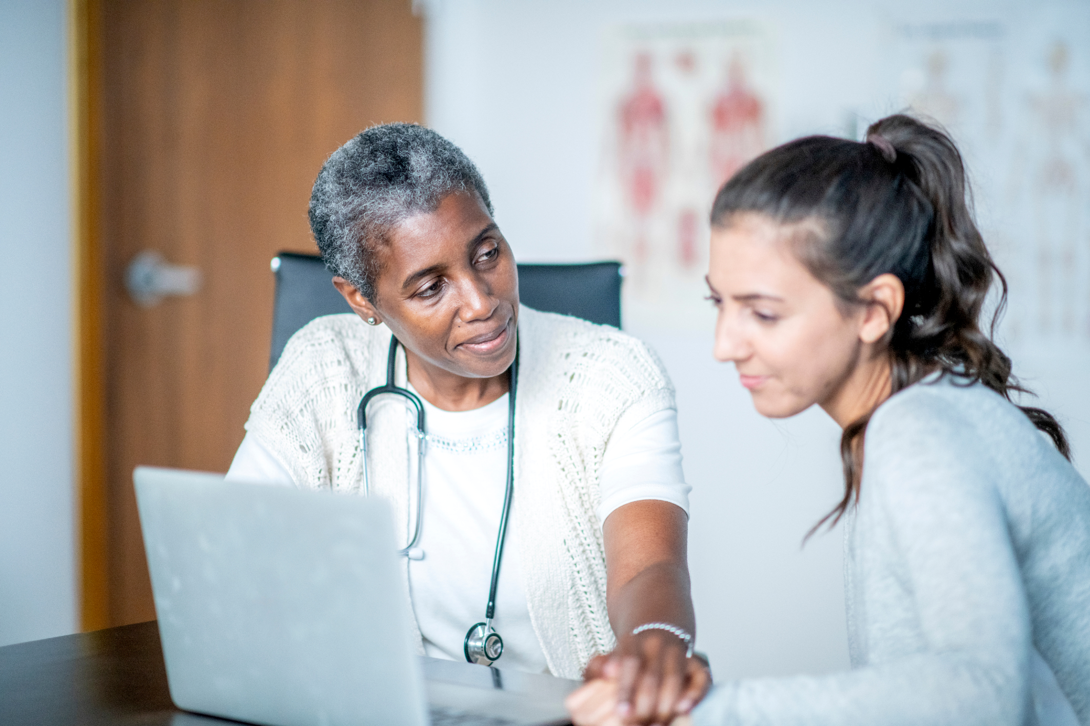Doctor explaining diagnosis to patient